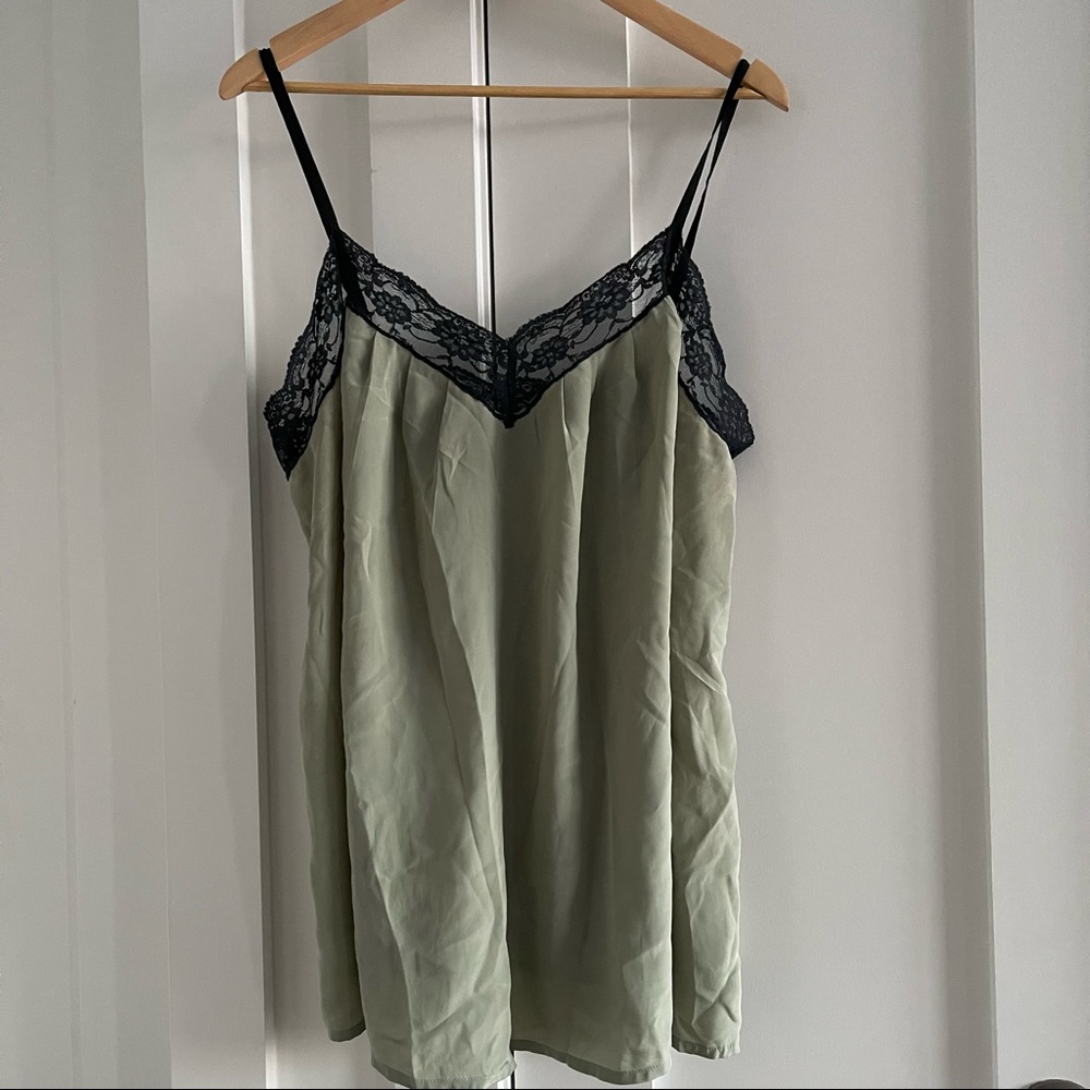 Seafoam green camisole with black lace trim